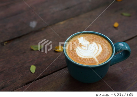 hot latte coffee drink put on wooden table in the morning day hot latte coffee drink put on wooden table in the morning day 60127339