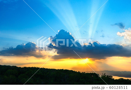 Sunset sky with ray light in twilight time Sunset sky with ray light in twilight time 60128511