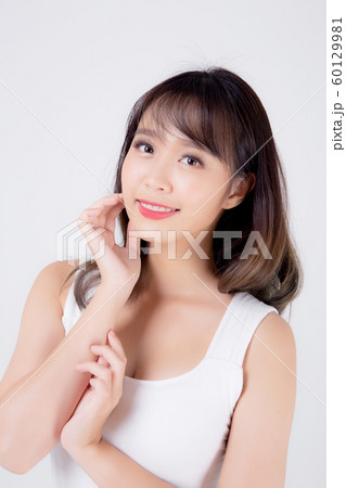 Beautiful woman asian makeup of cosmetic, beauty asia girl hand touch cheek and smile attractive Beautiful woman asian makeup of cosmetic, beauty asia girl hand touch cheek and smile attractive 60129981