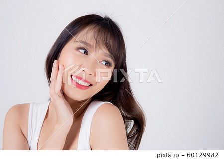 Beautiful woman asian makeup of cosmetic, beauty asia girl hand touch cheek and smile attractive 60129982