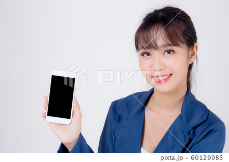 Beautiful portrait young business asian woman show blank smart mobile phone isolated Beautiful portrait young business asian woman show blank smart mobile phone isolated 60129985