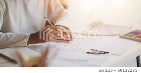 Close-up view of young professional architect Close-up view of young professional architect 60132235