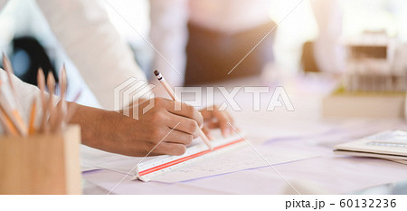 Cropped shot view of professional architect team Cropped shot view of professional architect team 60132236