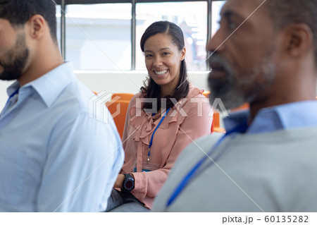 Business professionals at a conference 60135282