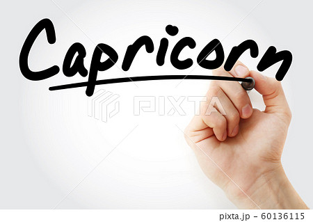 Hand writing Capricorn with marker 60136115
