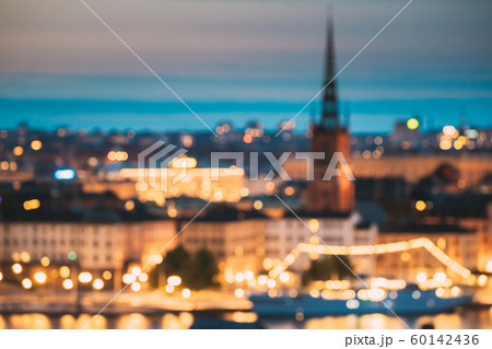 Stockholm, Sweden. Night Skyline Abstract Boke Bokeh Background. Design Backdrop. Riddarholm Church In Night Lighting. 60142436