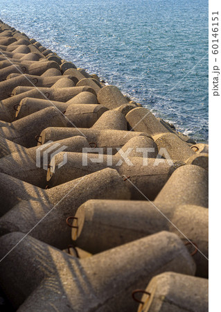 A waterbreaker dam beside the port at seaside 60146151