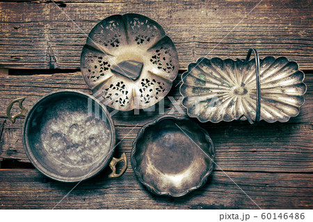 Old used silver and steel dishware 60146486