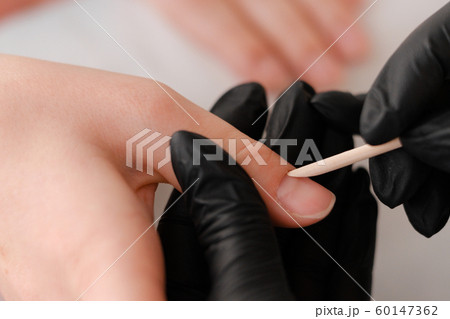 Cuticle movement with an orange stick. 60147362