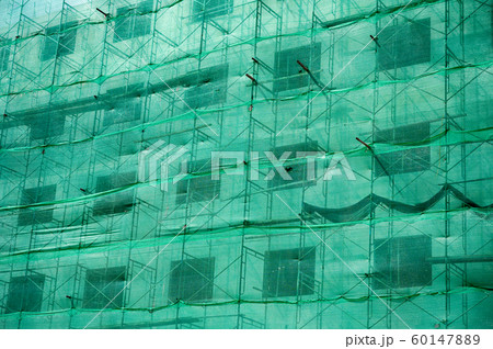 Building structure with green netting shade and Building structure with green netting shade and 60147889