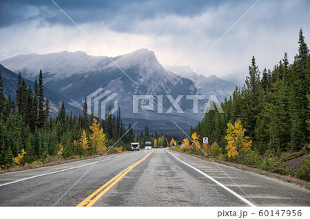 Scenic road trip with rocky mountain in autumn 60147956