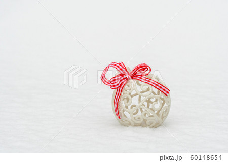 Christmas bauble  on the white fresh snow 60148654