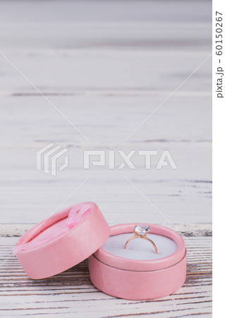 Jewelry box with golden ring. 60150267