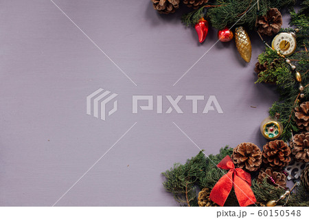 Christmas card gifts decor for the new year on a purple background Christmas card gifts decor for the new year on a purple background 60150548