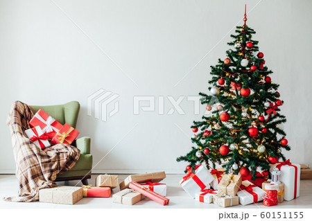 Christmas tree with red gifts decor interior for the new year Christmas tree with red gifts decor interior for the new year 60151155