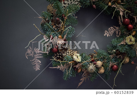 Christmas wreath of vines decorated with fir Christmas wreath of vines decorated with fir 60152839