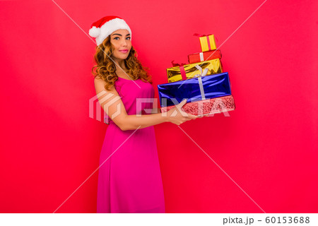 A beautiful sexy girl in a New Year's hat, hold in 60153688