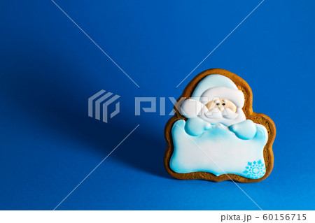 gingerbread cookie of Santa's with copyspace on 60156715