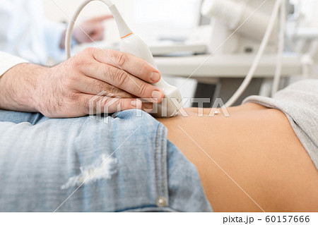 Close up of a doctor examines the internal organs Close up of a doctor examines the internal organs 60157666