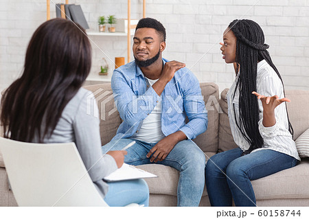 Black Couple Arguing During Marriage And Family Therapy Counselling Session 60158744