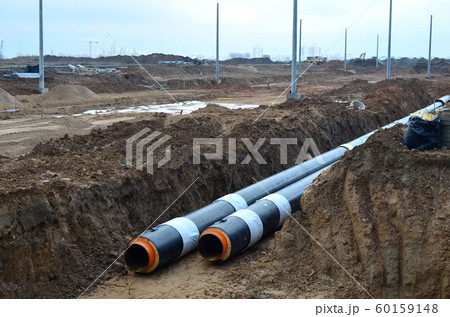 Laying underground storm sewers at a construction site Laying underground storm sewers at a construction site 60159148