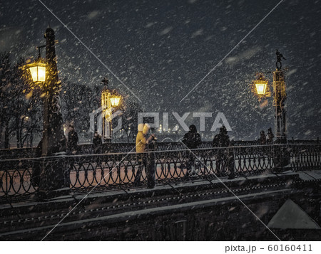 Falling snow in the night city. Saint-Petersburg. Falling snow in the night city. Saint-Petersburg. 60160411