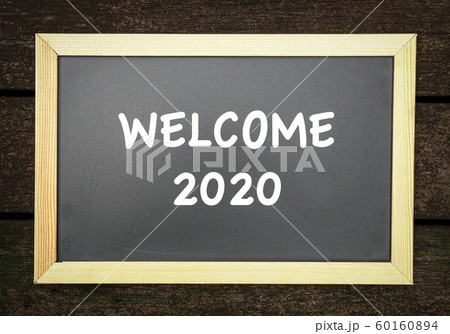 Welcome 2020, text on black board 60160894
