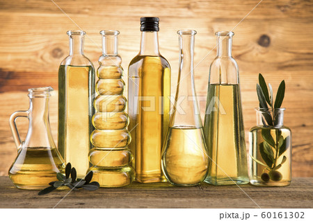 Bottles with organic cooking olive oil and olive 60161302