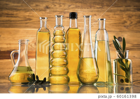 Cooking olive oils, bottles background 60161398