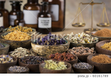 Natural remedy,Herbal medicine and wooden table 60161789