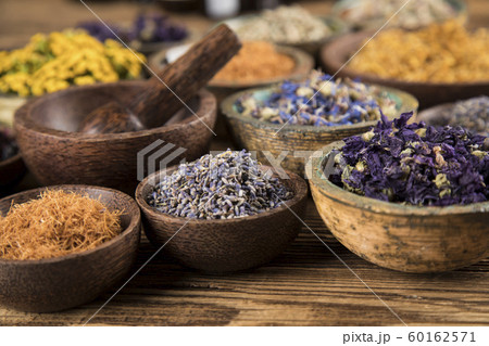 Natural remedy,Herbal medicine and wooden table 60162571