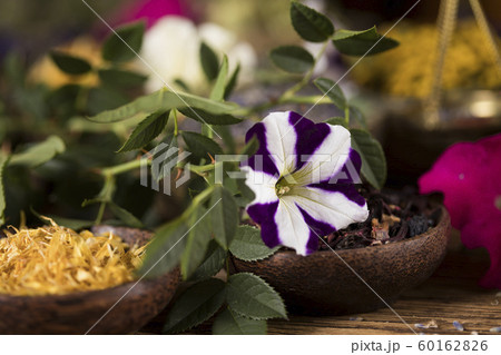 Natural remedy,Herbal medicine and wooden table Natural remedy,Herbal medicine and wooden table 60162826