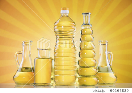 Rapeseed oil, sunflower oil, olive oil on sunburst 60162889