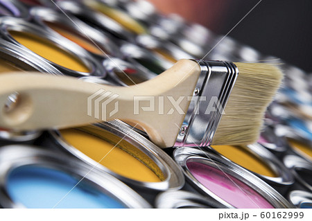 Colorful paint cans with paintbrush 60162999