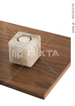 Candlestick made of natural salt on varnished Candlestick made of natural salt on varnished 60163219
