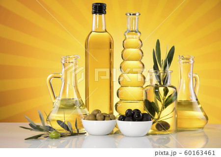 Bottles with organic cooking olive oil and olive 60163461