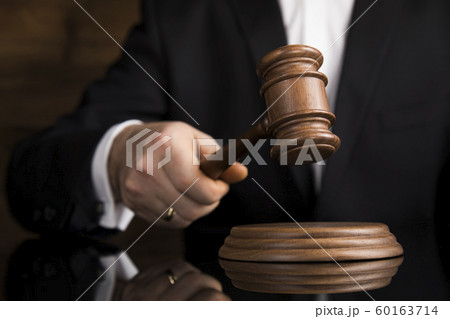 Justice and law concept, Male judge in a courtroom Justice and law concept, Male judge in a courtroom 60163714