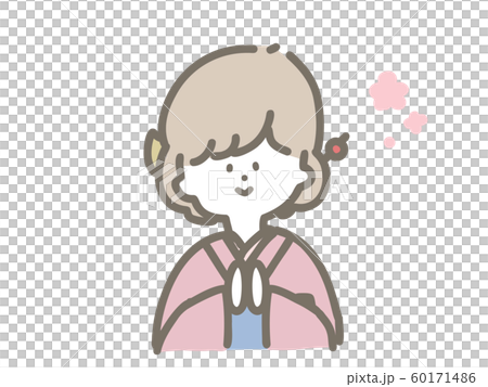  A girl wearing a kimono and posing for a palm 60171486