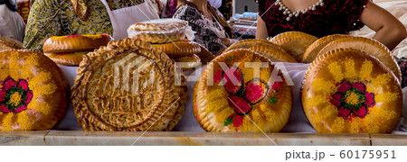 National uzbek bread sold in the market - Samarkand, Uzbekistan National uzbek bread sold in the market - Samarkand, Uzbekistan 60175951