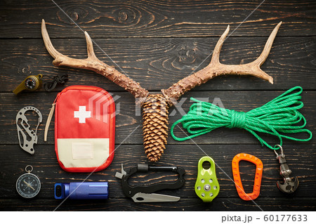 Travel items for hiking over wooden background 60177633
