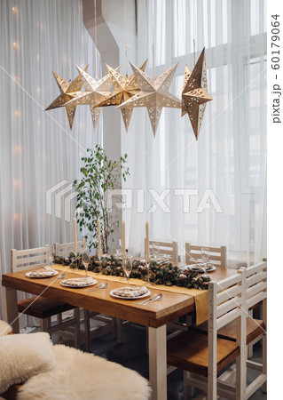 Beautiful Christmas serving table with candles and Beautiful Christmas serving table with candles and 60179064