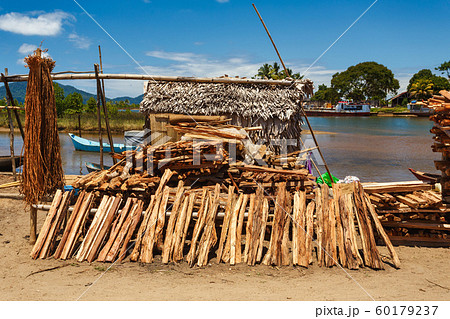 firewood on street marketplace, Maroantsetra 60179237