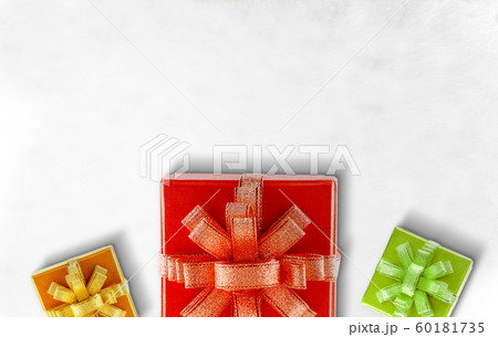 Colorful gift box with a ribbon Colorful gift box with a ribbon 60181735