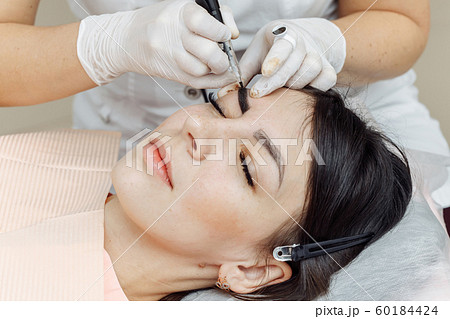Permanent makeup, tattooing of eyebrows Permanent makeup, tattooing of eyebrows 60184424