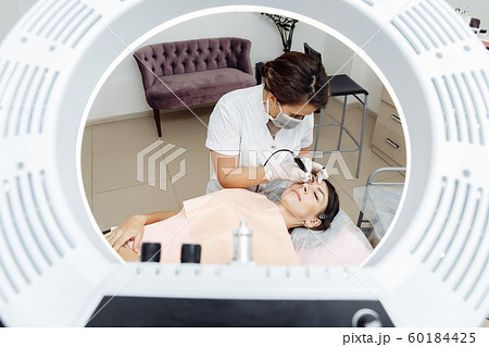 Permanent makeup, tattooing of eyebrows 60184425