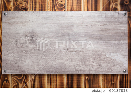 nameplate or wall sign at black wooden background nameplate or wall sign at black wooden background 60187838