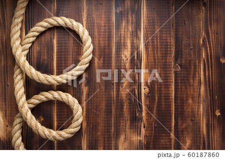 ship rope at wooden background 60187860