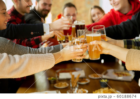 Happy co-workers celebrating while company party and corporate event Happy co-workers celebrating while company party and corporate event 60188674