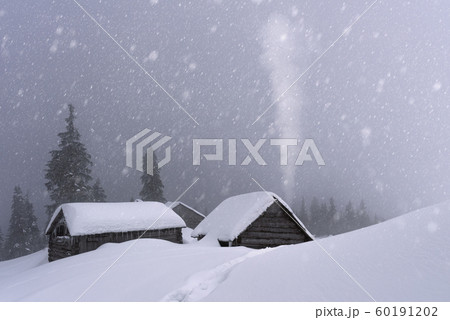Fantastic landscape with snowy house 60191202