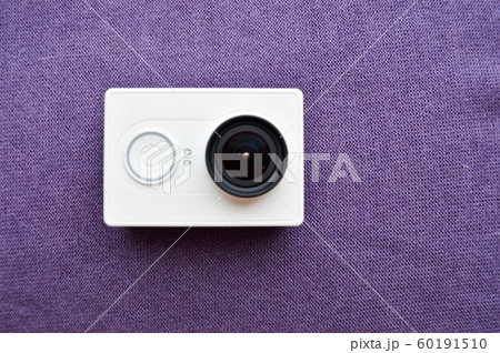 White action camera with a large black lens White action camera with a large black lens 60191510